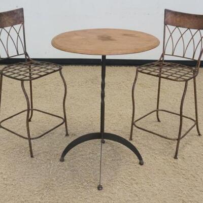 1323	3 PIECE IRON BISTRO SET, WOODEN TABLE TOP HAS STAINS, 26 IN DIAMETER X 35 1/2 IN HIGH
