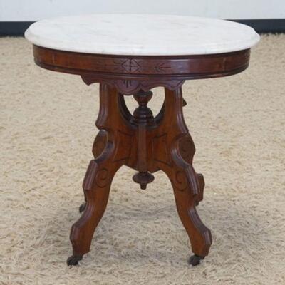 1328	SMALL OVAL VICTORIAN MARBLE TOP TABLE, 21 1/2 IN X 16 1/4 IN X 22 IN HIGH
