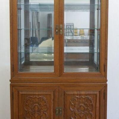 1292	LIGHTED MIRROR BACK DISPLAY CABINET, HAS GLASS SHELVES & CARVED LOWER DOORS, BASE HAS 2 INTERIOR DRAWERS, 76 IN HIGH X 40 IN WIDE X...