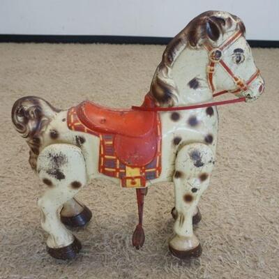 1172	METAL MOBO CHILDS VINTAGE RIDING HORSE, APPROXIMATELY 27 IN X 30 IN HIGH
