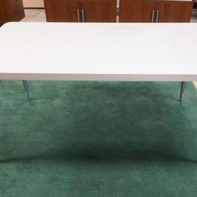 1041	CONTEMPORARY MODERN STYLE FORMICA KITCHEN TABLE W/TAPERED METAL LEGS, APPROXIMATELY 60 IN X 33 IN X 29 IN HIGH

