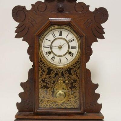 1127	NEW HAVEN GINGERBREAD SHELF CLOCK IN WALNUT CASE, APPROXIMATELY 22 1/2 IN HIGH
