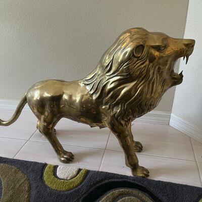 large brass floor statue/lion