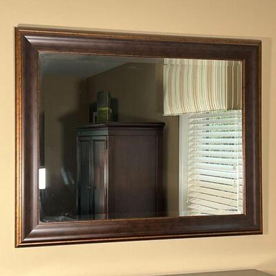 FRAMED WALL MIRROR | Beveled glass wall mirror with brown antiqued style wood frame; 37-1/2 x 48 in.