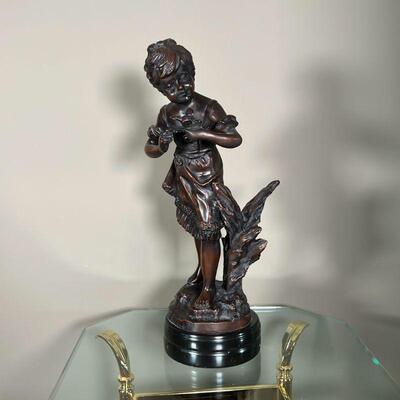 AUGUSTE MOREAU BRONZE SCULPTURE | Auguste Moreau signed bronze sculpture/statue of young girl holding a bird; h. 17-1/2 in.