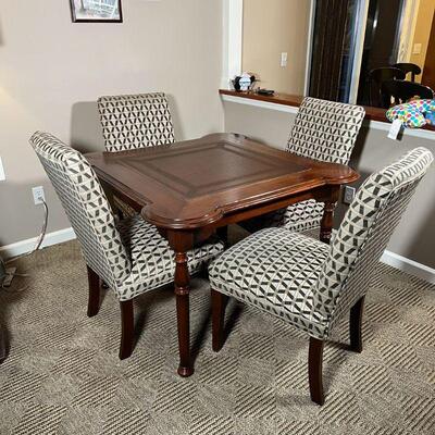 SARRIED LTD. CARD TABLE | Dark wood finish with leather playing surface, includes set of 4 Sam Moore dining chairs with fabric upholstery...