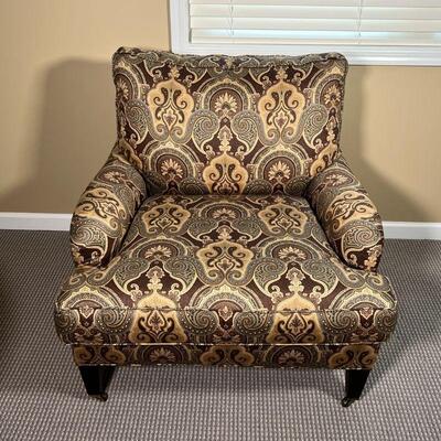 CUSTOM MADE ARM CHAIR | Paisley print armchair with two brass casters on the front legs, custom handcrafted by Lee Industries in the USA...