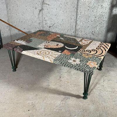 MOSAIC LOW TABLE | Mosaic low table depicting a woman's face and nature scenes, patinated wire frame legs; 16-1/2 x 32 x 48 in.