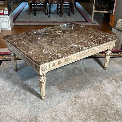 MARBLE TOP COFFEE TABLE | Light wood finish with reeded legs and overall carving, emperador dark style marble top; h. 17-3/4 x 43 x 31 in.