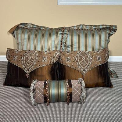 (5pc) LOT of THROW PILLOWS | Eastern Accents pillow set including: a pair of striped sham pillows (29 x 29 in.), a pair of brown throw...