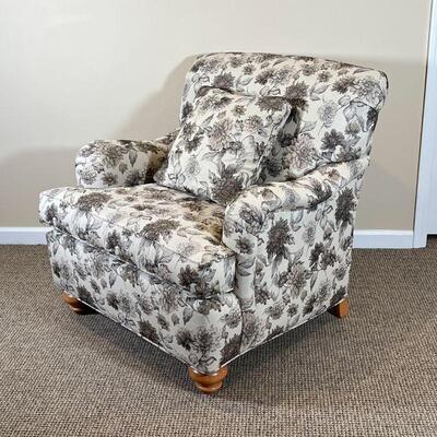 ETHAN ALLEN ARMCHAIR | Custom floral fabric upholstery and a matching pillow, with bun feet in the front; h. 34 x 31 x 34 in.