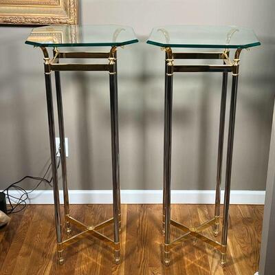 PAIR GLASS SIDE TABLES | Beveled glass side tables / pedestals, having octagonal tops over gold and chrome frames; each h. 41-3/4 x 18 x...