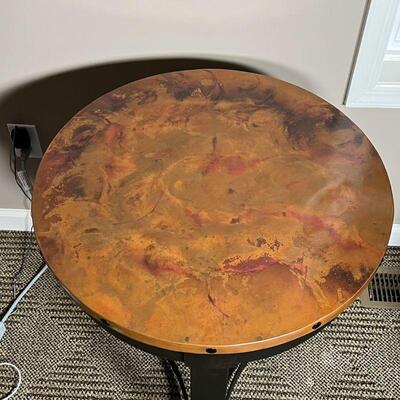 PATINA COPPER SIDE TABLE | Round side table with patina copper top and black metal frame; h. 26-1/2 x 23-1/2 in.