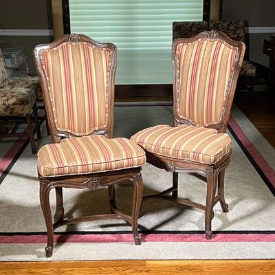 PAIR FRENCH STYLE CHAIRS | Two Rococo style side chairs with cane seats, padded upholstered seat backs and matching seat cushions in...