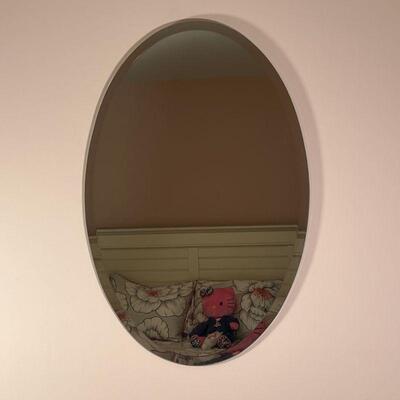 OVAL WALL MIRROR | Ovalular wall mirror with beveled glass, unframed; 36 x 24 in.