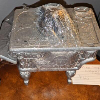 This is a salesman sample of a kitchen wood stove. It's roughly 100 years old and looks brand new