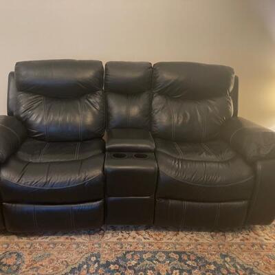 Havertys dual electric leather recliners with Bluetooth Console $550