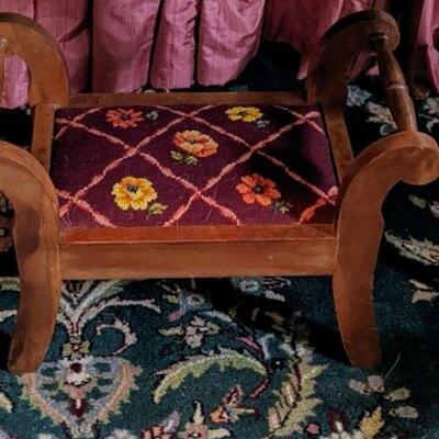Antique stool with needlepoint top