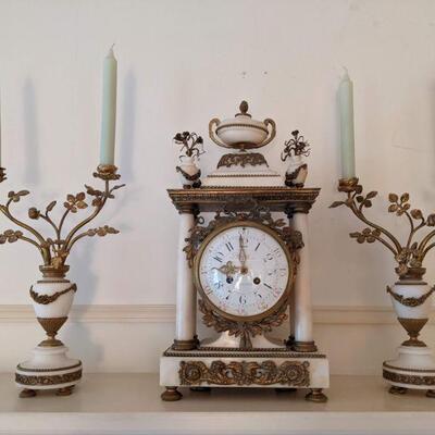 Antique clock. Planchon a Paris clock with pair marble urns.
