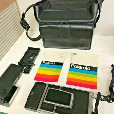 https://www.ebay.com/itm/125329690791	OL7035 Polaroid Impulse Instant Camera With Carrying Case LOCAL PICKUP		Auction	begins 05/27/2022...