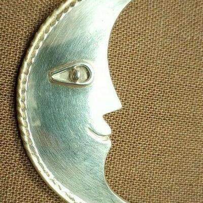 https://www.ebay.com/itm/125329700733	MA3000 STERLING SILVER MEXICAN MAN IN THE MOON BROOCH, TC-76 13.8 GRAMS		Auction	begins 05/27/2022...