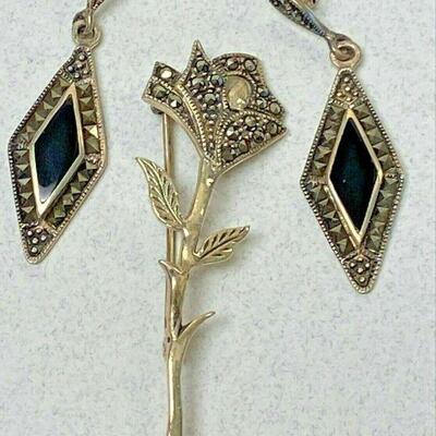 https://www.ebay.com/itm/115405701652	LB1063 STERLING SILVER DIAMING SHAPE ONYX STONE EARRINGS AND ROSE PIN		BIN	 $24.99 
