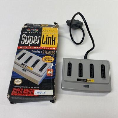 https://www.ebay.com/itm/115399259444	NC563 Nintendo SNES Super Link Multi-Player Controller Adapter 1994 Original 		Auction	begins...