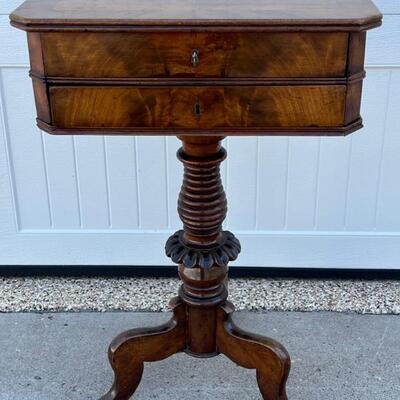 Antique mahogany work table or petite desk. A wonderful size beautiful antique table with a gorgeous finish. Features two drawers with...