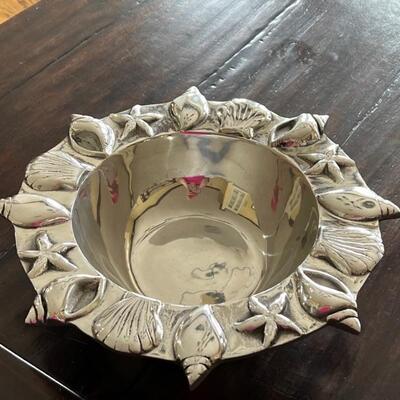 Decorative Metal Seashell Themed Serving Bowl. What a fun and lovely pattern along the rim of the bowl! Measures 12" x 4" and...