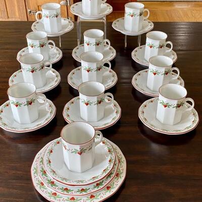 Set of 13 Porsgrund Multi-Sided Teacups and Saucers and one salad plate and one bread plate. All in very good condition. 