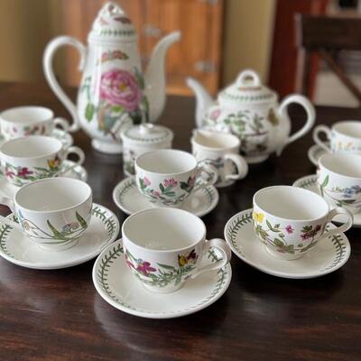 Portmeirion Botanic Garden Tea Set including two teapots, cream/sugar set, 8 teacups and saucers. All in very good condition. 