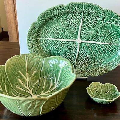 Three pieces of cabbage leaf dishes by Bordallo Pinheiro with the platter measuring 17â€ x 12.5â€ 