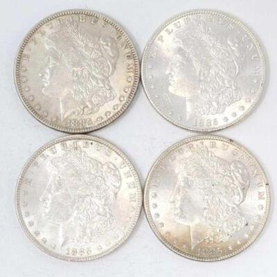 #1340 â€¢ (4) 1885 Morgan Silver Dollars, 107g. Weighs Approx: 107g Philadelphia Mints. 