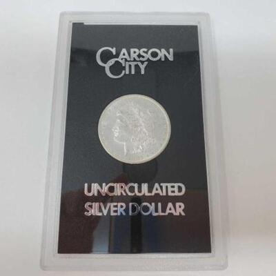 #1208 â€¢ 1883 Morgan Silver Dollar. Carson City Mint Uncirculated Morgan Silver Dollar