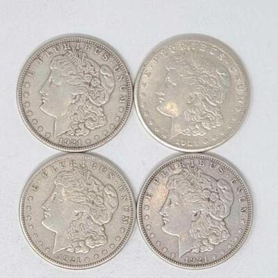 #1278 â€¢ (4) 1921 Morgan Silver Dollars, 106.9g. Weighs Approx: 106.9g (3) San Francisco Mints and (1) Denver Mint. 