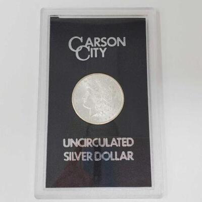 #1212 â€¢ 1881 Morgan Silver Dollar. Carson City Mint Uncirculated Morgan Silver Dollar.
