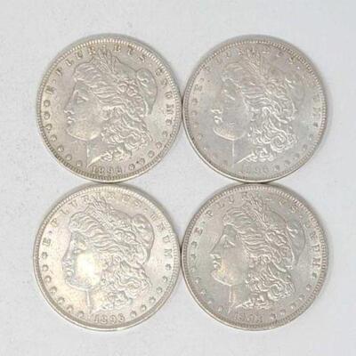 #1282 â€¢ (4) Morgan Silver Dollars, 107g. Weighs Approx: 107g (3) 1896 Philadelphia Mints and (1) 1903 Philadelphia Mint.