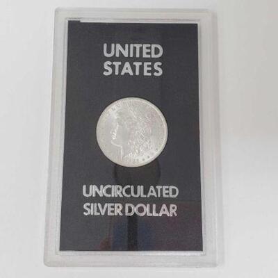 #1198 â€¢ 1884 Morgan Silver Dollar. Carson City Mint Uncirculated Morgan Silver Dollar.