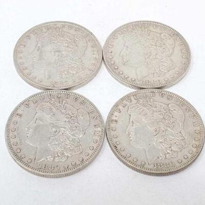 #1334 â€¢ (4) 1880 Morgan Silver Dollars, 106.8g. Weighs Approx: 106.8g Philadelphia Mints. 