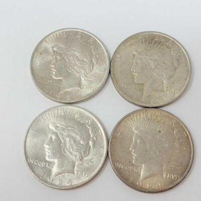 #1530 â€¢ (4) Silver Peace Dollars, 107.3g. Weighs Approx: 107.3g (3) 1924 Philadelphia Mints and (1) 1922 Philadelphia Mint