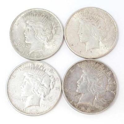 #1535 â€¢ (4) 1923 Silver Peace Dollars, 107g. (2) Denver, (1) San Francisco and (1) Philadelphia Mints.