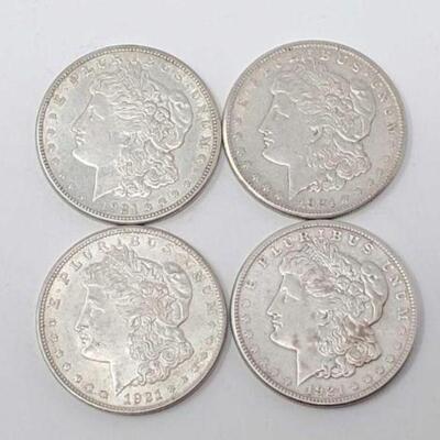 #1349 â€¢ (4) 1921 Morgan Silver Dollars. Includes: (3)1921 San Francisco Mints (1)1921 Philadelphia Mint. 