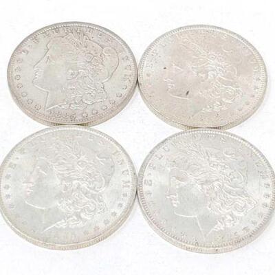 #1338 â€¢ (4) 1885 Morgan Silver Dollars, 107g. xWeighs Approx: 107g New Orleans Mints. 