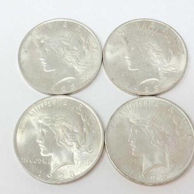 #1529 â€¢ (4) 1923 Silver Peace Dollars, 107g. Weighs Approx: 107g Philadelphia Mints