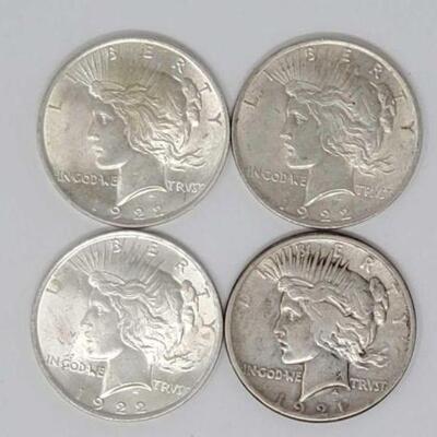 #1546 â€¢ (4) 1921 & 1922 Silver Peace Dollars, 106.9g. Weighs Approx: 106.9g (3) 1922 Philadelphia Mints and (1) 1921 Philadelphia Mint.