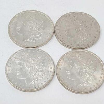 #1332 â€¢ (4) 1880-1898 Morgan Silver Dollars, 107g. Weighs Approx: 107g Includes (2) 1880 & (2) 1898 Morgan Silver Dollars. 