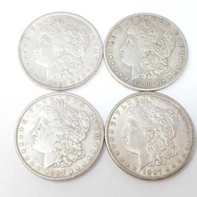 #1244 â€¢ (4) 1897 Morgan Silver Dollars.Weighs Approx: 107g Philadelphia and San Francisco Mints.