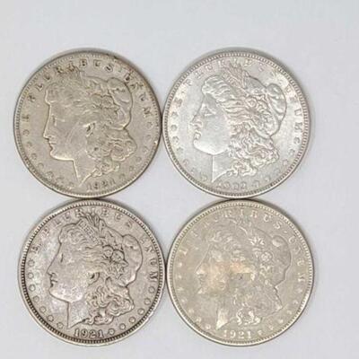 #1284 â€¢ (4) Morgan Silver Dollars, 107g. Weighs Approx: 107g (1) 1903 Philadelphia Mint, (1) 1921 Denver Mint, and (2) 1921 San...