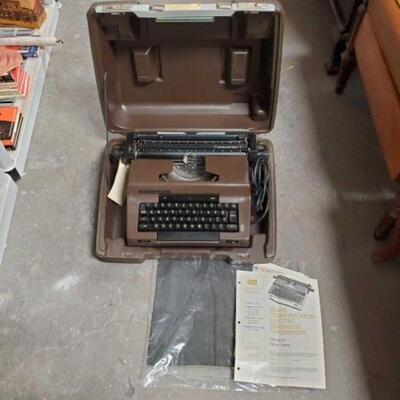 #2046 â€¢ Vintage Sears Communicator Electric Typewriter. Includes Original Case, Mat and Manual.