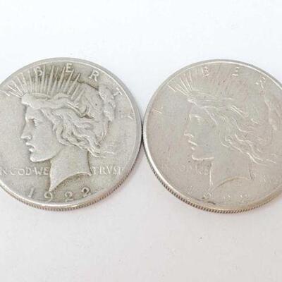 #1552 â€¢ (2) 1922 Silver Peace Dollars, 53.5g. Weighs Approx: 53.5g San Francisco Mints. 